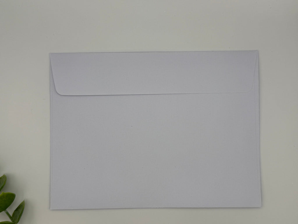 Plain white envelope on a light gray background